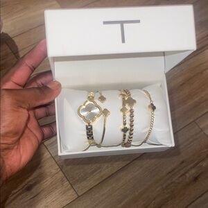 T Tahari Elegant Gold and White Bracelet Collection
